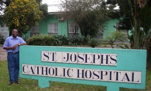 Patrick Nshamdze, outside St Joseph’s Catholic Hospital in Monrovia, who helped IPPNW doctors gain access to medical records died from Ebola – the report is dedicated to him. Photo: Lucie Collinson